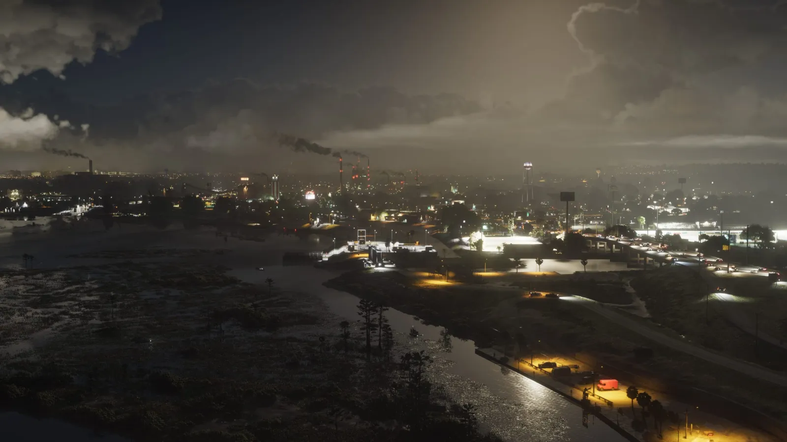 A moody night aerial of an industrial Leonida town in GTA 6, with smokestacks, wetlands and lit highways